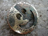 Etched and pierced brass brooch 