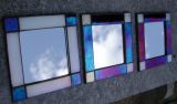 Mirrors with iridescent frames